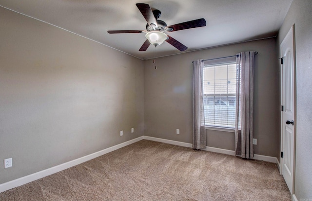 68 Smarty Jones Cir, Austin, AR 72007 - empty room featuring carpet floors, ceiling fan, and baseboards