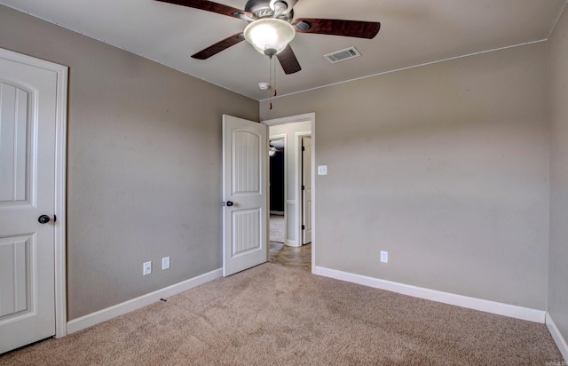 68 Smarty Jones Cir, Austin, AR 72007 - unfurnished bedroom with carpet floors, baseboards, and a ceiling fan