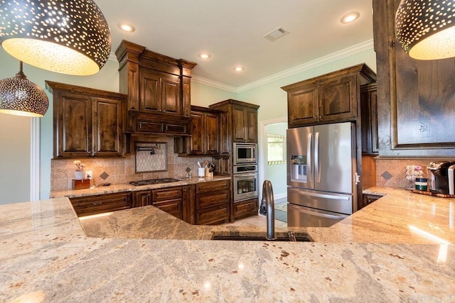 402 Nicholson Rd, Searcy, AR 72143 - kitchen with stainless steel appliances, a sink, light stone countertops, crown molding, and recessed lighting