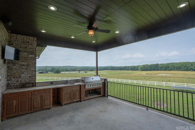 402 Nicholson Rd, Searcy, AR 72143 - view of patio / terrace with a view of countryside, a sink, and ceiling fan