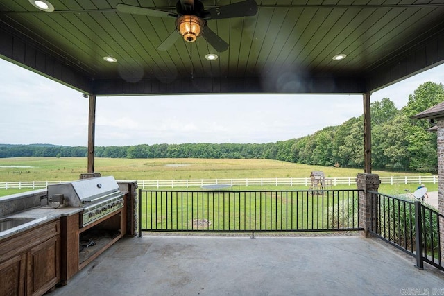 402 Nicholson Rd, Searcy, AR 72143 - view of patio / terrace featuring a rural view, area for grilling, and a ceiling fan