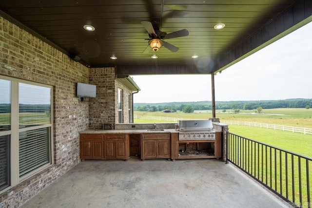 402 Nicholson Rd, Searcy, AR 72143 - view of patio with a sink and a ceiling fan