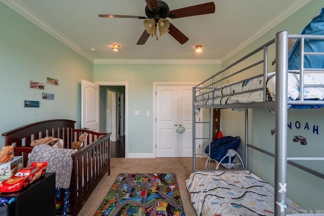 402 Nicholson Rd, Searcy, AR 72143 - bedroom featuring ornamental molding, baseboards, a ceiling fan, a closet, and carpet