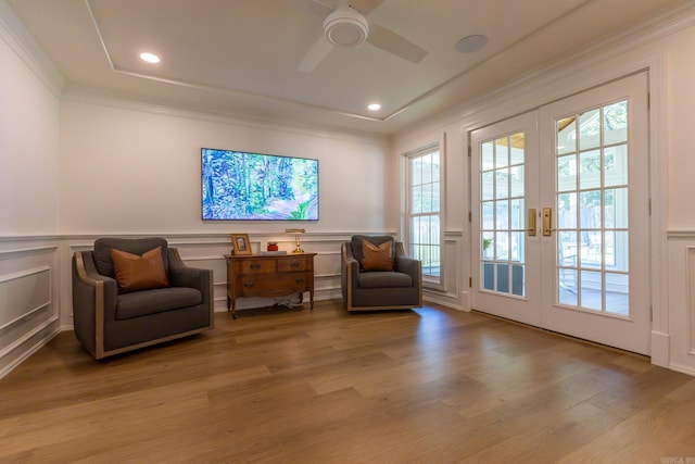 40 Tennyson Ct, North Little Rock, AR 72116 - living area with french doors, a decorative wall, crown molding, a ceiling fan, and light wood-style flooring