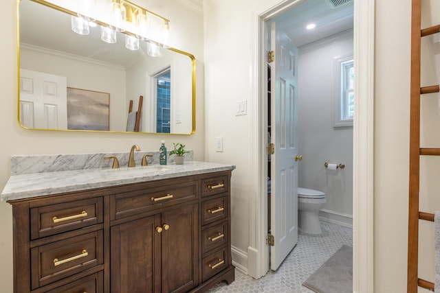40 Tennyson Ct, North Little Rock, AR 72116 - bathroom featuring vanity, toilet, crown molding, tile patterned flooring, and baseboards