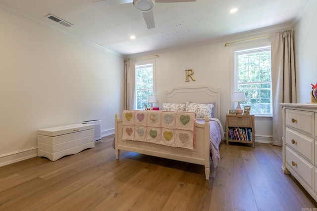 40 Tennyson Ct, North Little Rock, AR 72116 - bedroom with crown molding, multiple windows, light wood-type flooring, baseboards, and a ceiling fan