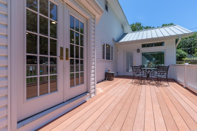 40 Tennyson Ct, North Little Rock, AR 72116 - wooden deck featuring outdoor dining space and french doors