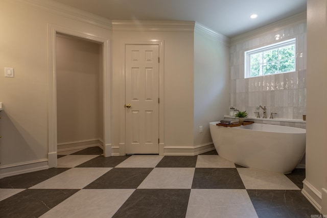 40 Tennyson Ct, North Little Rock, AR 72116 - full bath featuring a soaking tub, crown molding, and baseboards