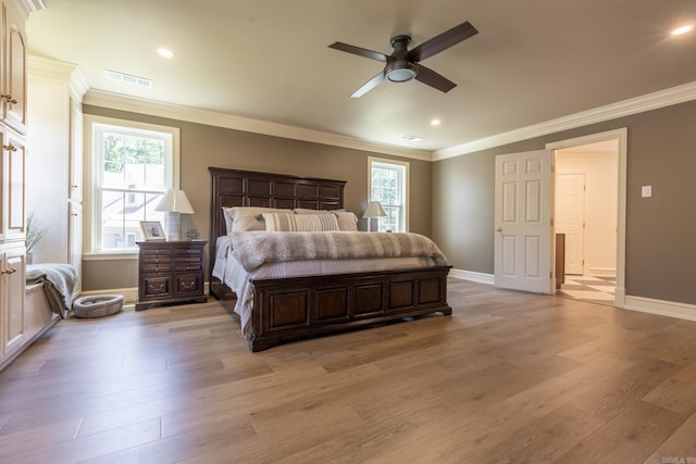 40 Tennyson Ct, North Little Rock, AR 72116 - bedroom featuring light wood-type flooring, multiple windows, ornamental molding, and recessed lighting