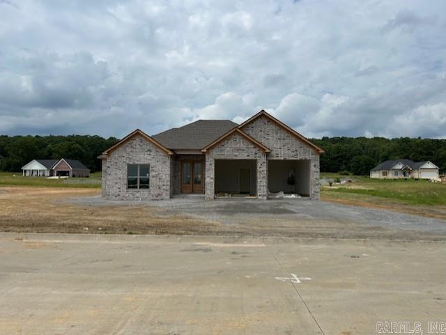 9 Ridge View Cv, Vilonia, AR 72173 - view of front of house with driveway and french doors