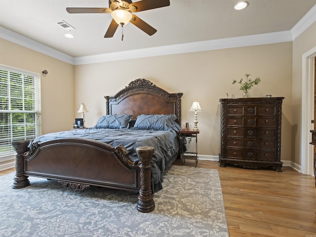 57 Excelso Way, Hot Springs Village, AR 71909 - bedroom featuring ornamental molding, wood finished floors, a ceiling fan, recessed lighting, and baseboards