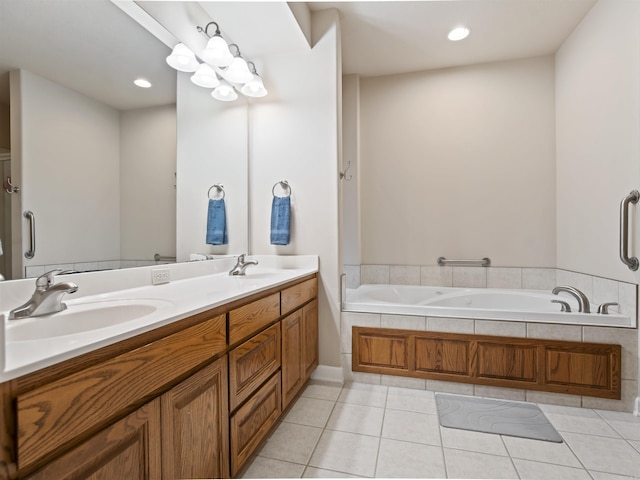 57 Excelso Way, Hot Springs Village, AR 71909 - bathroom featuring a garden tub, double vanity, tile patterned flooring, and recessed lighting