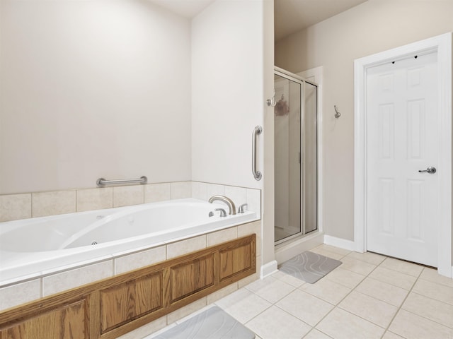57 Excelso Way, Hot Springs Village, AR 71909 - bathroom with a shower stall, a bath, and tile patterned flooring