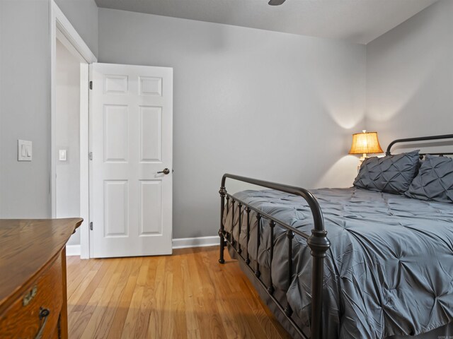 57 Excelso Way, Hot Springs Village, AR 71909 - bedroom featuring light wood-type flooring and baseboards