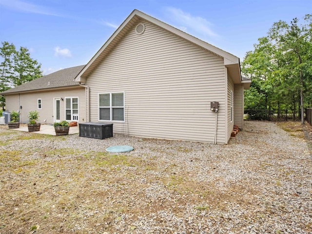 57 Excelso Way, Hot Springs Village, AR 71909 - rear view of property with a shingled roof