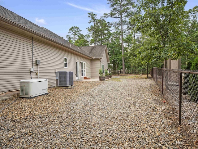 57 Excelso Way, Hot Springs Village, AR 71909 - fenced backyard with central AC unit