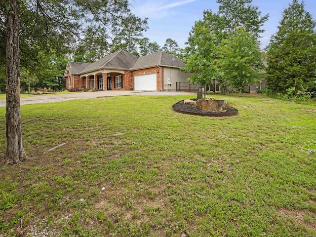 57 Excelso Way, Hot Springs Village, AR 71909 - ranch-style home with a garage, brick siding, a front yard, and driveway
