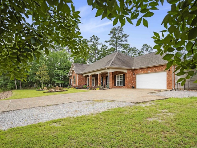 57 Excelso Way, Hot Springs Village, AR 71909 - view of front of house with concrete driveway, an attached garage, a front yard, brick siding, and roof with shingles