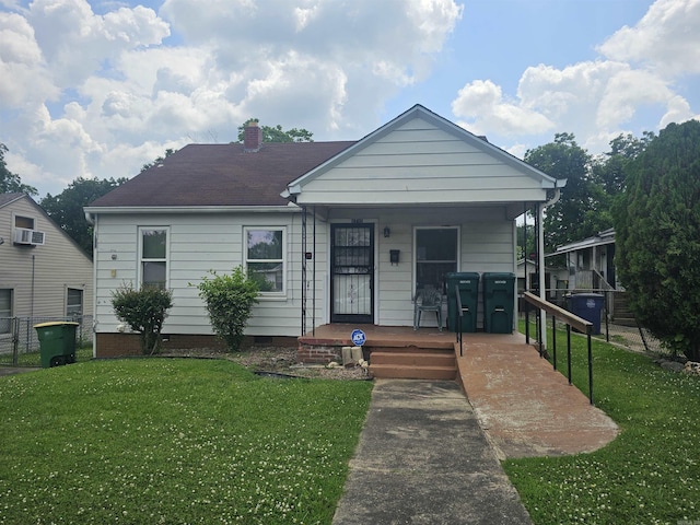 1710 N Magnolia, North Little Rock, AR 72114 - view of front facade with a porch, a chimney, and crawl space