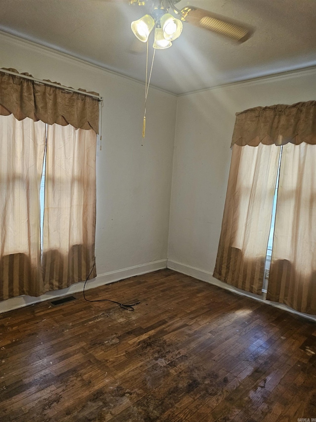 1710 N Magnolia, North Little Rock, AR 72114 - spare room featuring hardwood / wood-style floors, baseboards, and a ceiling fan