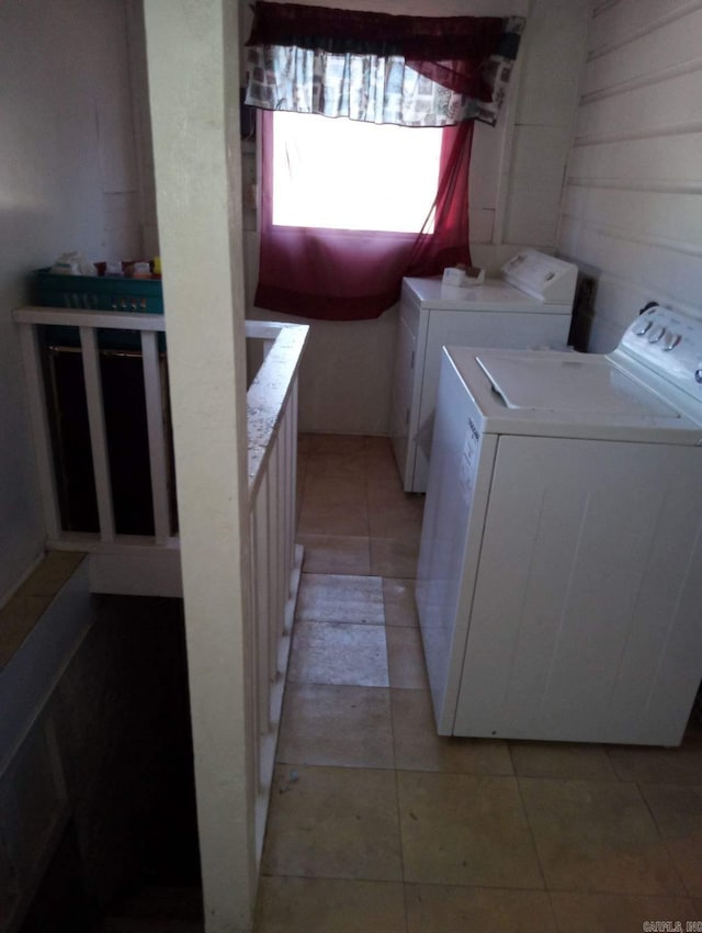 1710 N Magnolia, North Little Rock, AR 72114 - washroom with independent washer and dryer and light tile patterned floors