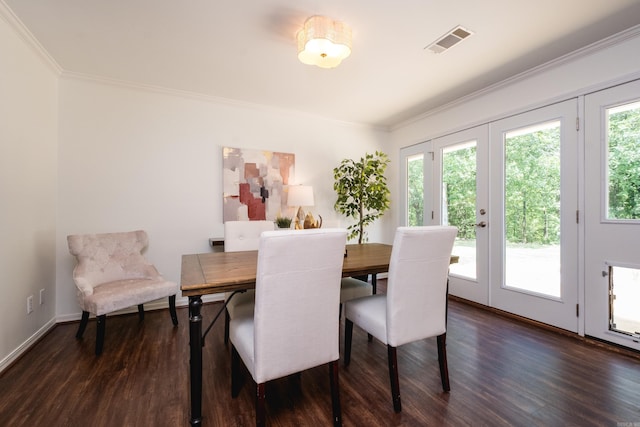 69 Quail Valley Rd, Sherwood, AR 72120 - dining space featuring dark wood-style floors, crown molding, french doors, and baseboards