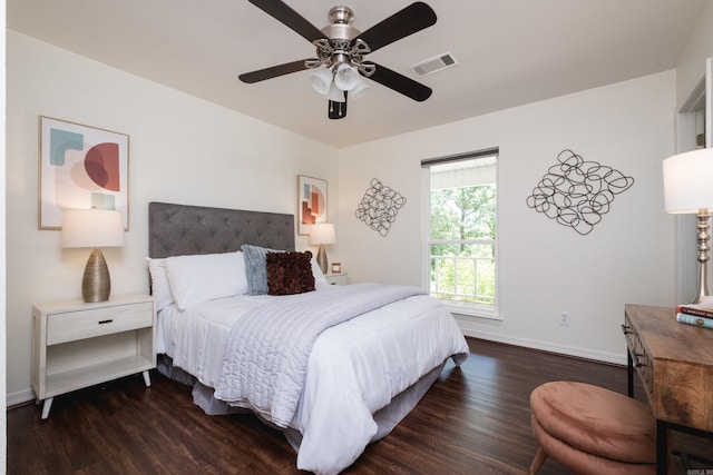 69 Quail Valley Rd, Sherwood, AR 72120 - bedroom featuring dark wood-style flooring, baseboards, and a ceiling fan