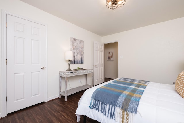 69 Quail Valley Rd, Sherwood, AR 72120 - bedroom featuring wood finished floors and baseboards
