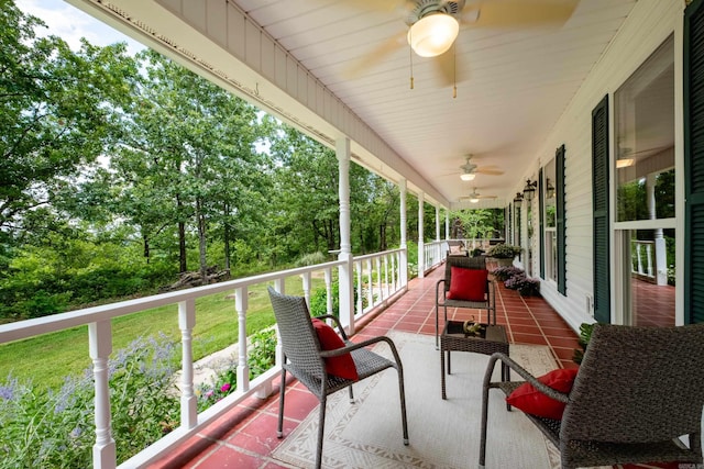 69 Quail Valley Rd, Sherwood, AR 72120 - porch with ceiling fan and view of scattered trees