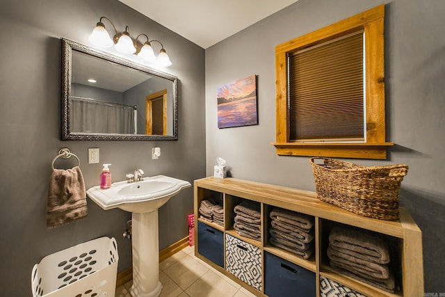 220 Brown Rd, Greers Ferry, AR 72067 - bathroom featuring tile patterned flooring and baseboards