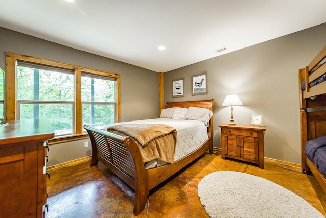 220 Brown Rd, Greers Ferry, AR 72067 - bedroom featuring baseboards, concrete floors, and recessed lighting