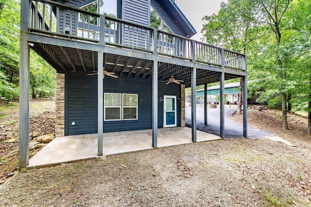 220 Brown Rd, Greers Ferry, AR 72067 - back of property with ceiling fan, a patio, and a wooden deck