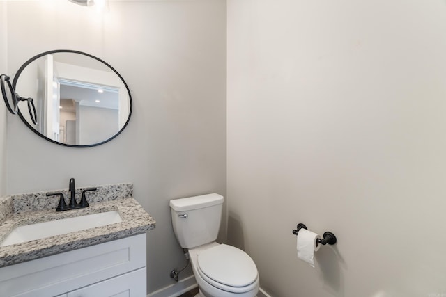 1569 Marquee Cir, Cabot, AR 72023 - bathroom featuring toilet, vanity, and baseboards