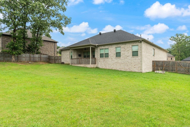 1569 Marquee Cir, Cabot, AR 72023 - back of house featuring a ceiling fan, brick siding, and a shingled roof