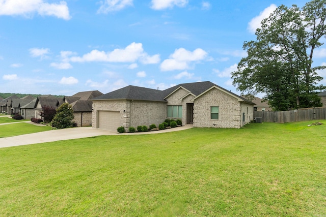 1569 Marquee Cir, Cabot, AR 72023 - view of front of property featuring brick siding, concrete driveway, an attached garage, and a shingled roof