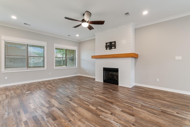1569 Marquee Cir, Cabot, AR 72023 - unfurnished living room featuring ceiling fan, a fireplace, wood finished floors, crown molding, and recessed lighting