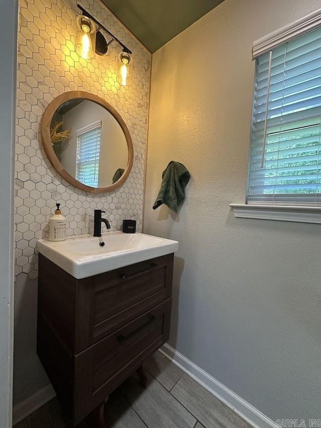 9 Whispering Dr, Alexander, AR 72002 - bathroom featuring vanity and baseboards