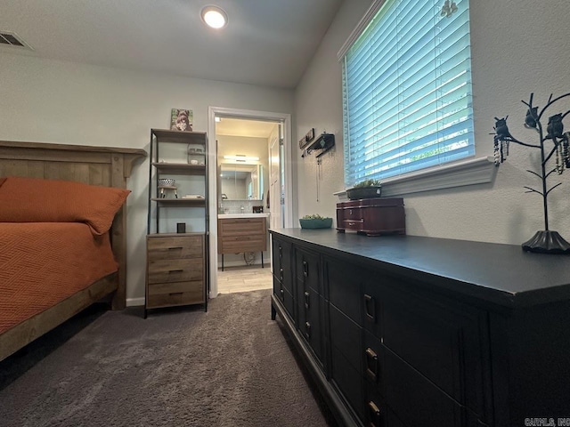 9 Whispering Dr, Alexander, AR 72002 - bedroom featuring carpet flooring and connected bathroom