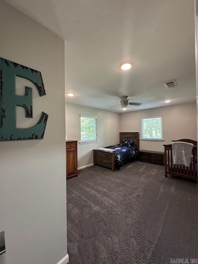 9 Whispering Dr, Alexander, AR 72002 - bedroom with baseboards, dark colored carpet, multiple windows, a ceiling fan, and recessed lighting