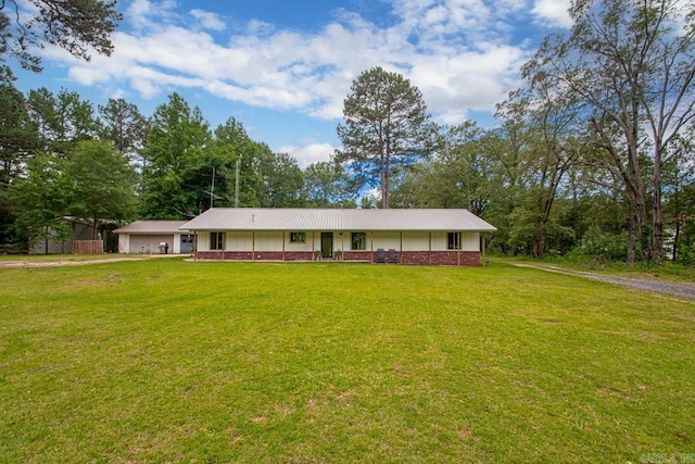21 Evergreen Park, Cabot, AR 72023 - single story home with a front lawn, a garage, driveway, and metal roof