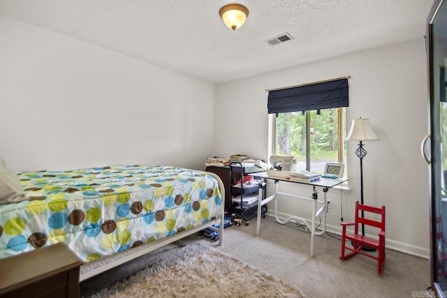 21 Evergreen Park, Cabot, AR 72023 - bedroom featuring carpet flooring, a textured ceiling, and baseboards