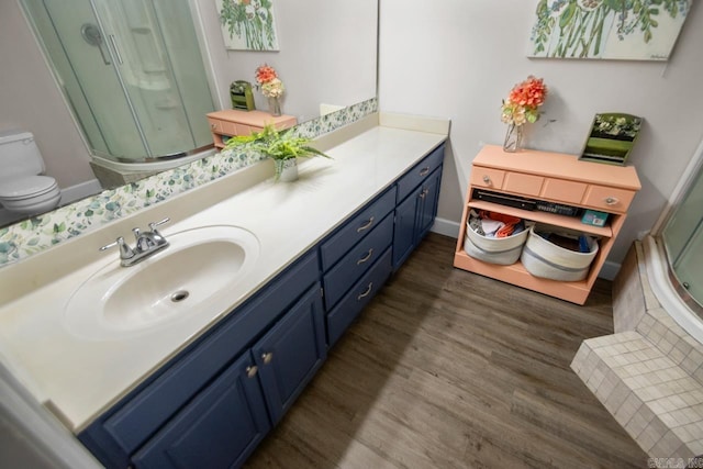21 Evergreen Park, Cabot, AR 72023 - full bath with toilet, wood finished floors, vanity, and a shower with door