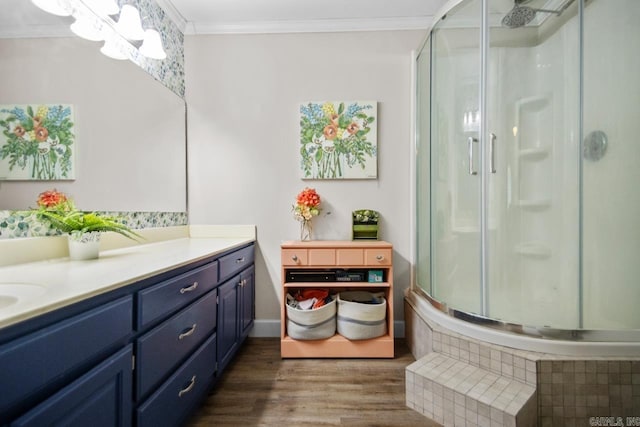 21 Evergreen Park, Cabot, AR 72023 - bathroom with a shower stall, vanity, ornamental molding, wood finished floors, and a chandelier