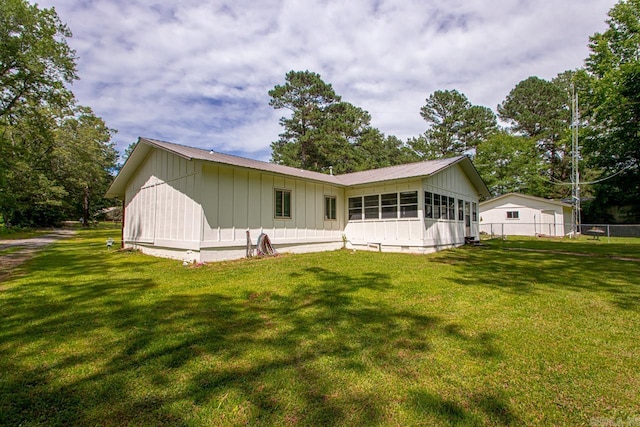 21 Evergreen Park, Cabot, AR 72023 - rear view of property featuring board and batten siding and metal roof