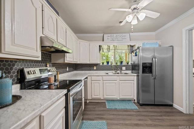 21 Evergreen Park, Cabot, AR 72023 - kitchen featuring appliances with stainless steel finishes, under cabinet range hood, ornamental molding, a sink, and light countertops