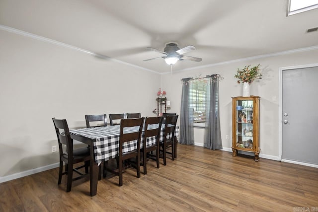 21 Evergreen Park, Cabot, AR 72023 - dining space featuring a ceiling fan, wood finished floors, ornamental molding, and baseboards