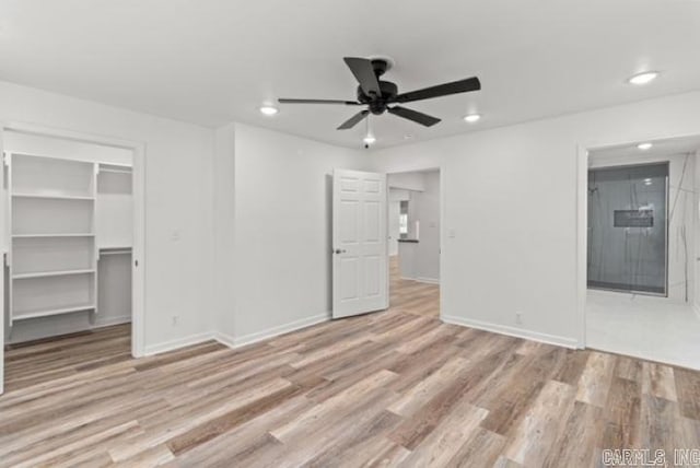 1506 N Pratt St, Pocahontas, AR 72455 - unfurnished living room with a ceiling fan, wood finished floors, recessed lighting, and baseboards