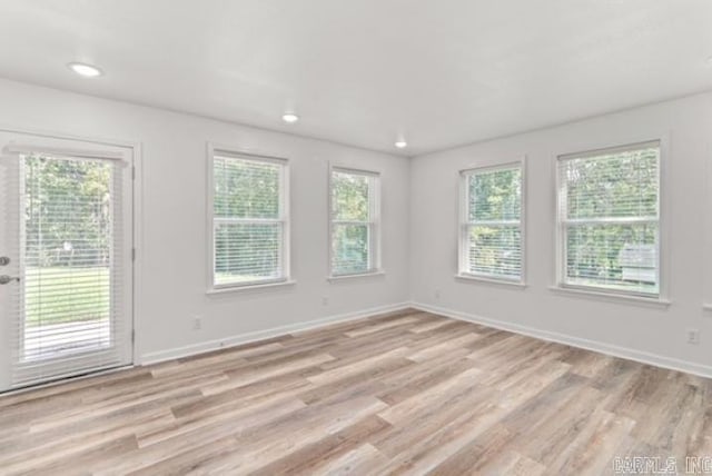 1506 N Pratt St, Pocahontas, AR 72455 - spare room with light wood-style floors, baseboards, and recessed lighting