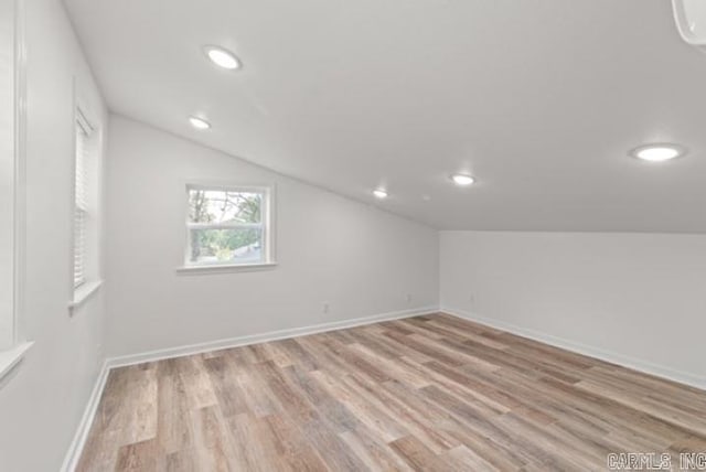 1506 N Pratt St, Pocahontas, AR 72455 - bonus room featuring light wood-style floors, vaulted ceiling, recessed lighting, and baseboards