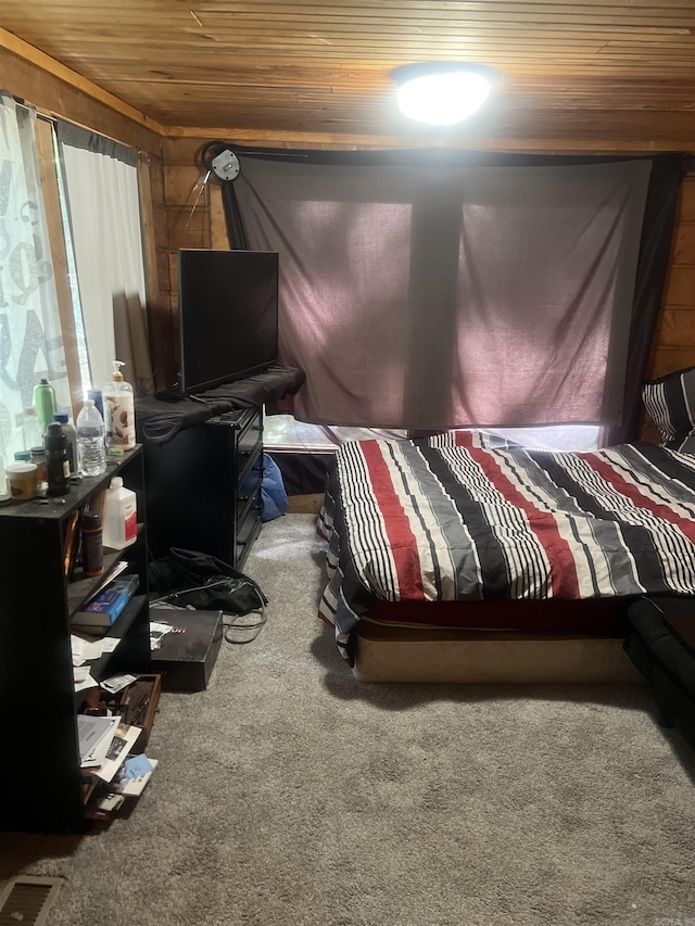 1203 Stewart Rd, Little Rock, AR 72223 - bedroom featuring wood ceiling and carpet